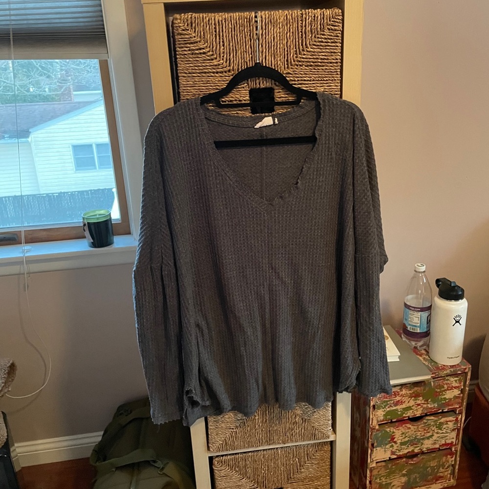 Out from under sweater